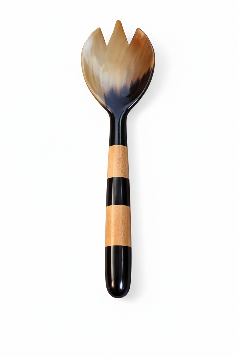 Handmade Haitian amber horn and striped wood salad fork on white background
