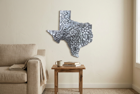 Texas floral metal wall art above a living room side table