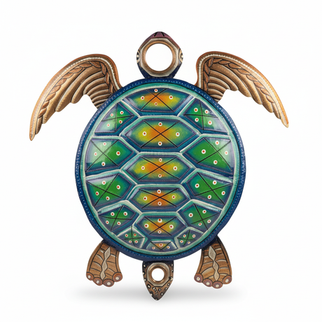 Handcrafted Haitian metal sea turtle sculpture with vibrant hand-painted green, blue, and yellow shell pattern