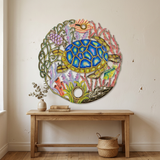 Round Haitian metal sea turtle wall art above a wooden living room console.
