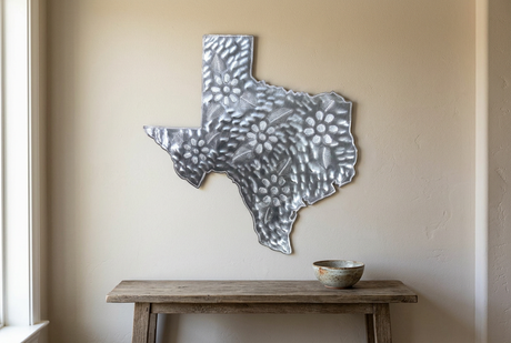 Handcrafted Texas state metal wall art above an entryway console