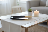 Haitian black ox horn bowl on minimalist coffee table with candle and succulent