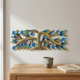 Handmade Haitian metal tree with blue flowers above an oak office desk