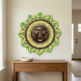Green Haitian sun wall art above an oak entryway console