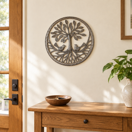 Haitian recycled steel Tree of Life wall art with two birds above an entryway console