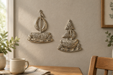 Going Sailing recycled steel drum sailboat pair in a dining nook