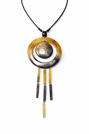 Handmade Haitian ox horn amber ring frame with grey dome disc and four bar fringe dangles necklace on white background