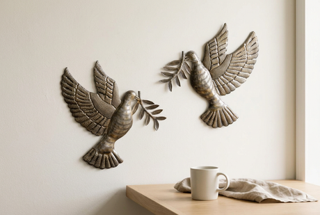 Recycled oil drum metal dove set displayed in a dining nook