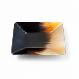 Handmade Haitian black and amber sunset square ox horn bowl on white background