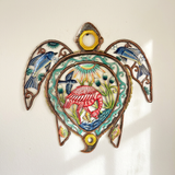 Oil Drum Top Turtle metal wall art with a pink flamingo, blue birds, and painted water details