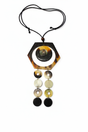 Handmade Haitian ox horn hexagon frame with grey dome disc and two graduated disc cascade strands on white background