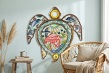 Colorful Haitian turtle metal wall art in a coastal reading nook