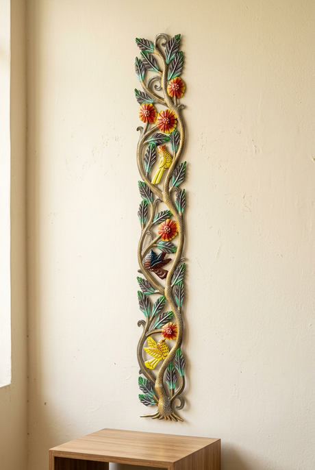 Painted birds, flowers, green leaves, and textured trunk in Tall Tree steel drum wall art.