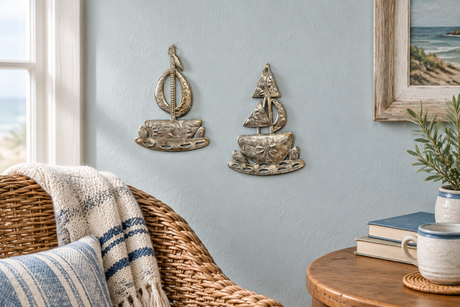 Going Sailing metal sailboat wall art pair in a coastal reading nook