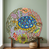 22-inch round sea turtle metal wall art above an entryway bench.