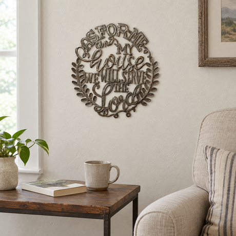 As for Me and My House Haitian metal wall art beside a living room armchair